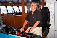 Captain Daley at Helm